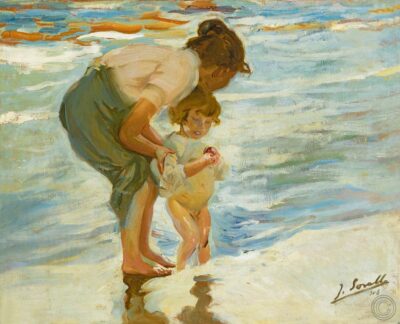 Madre con niño en la playa
